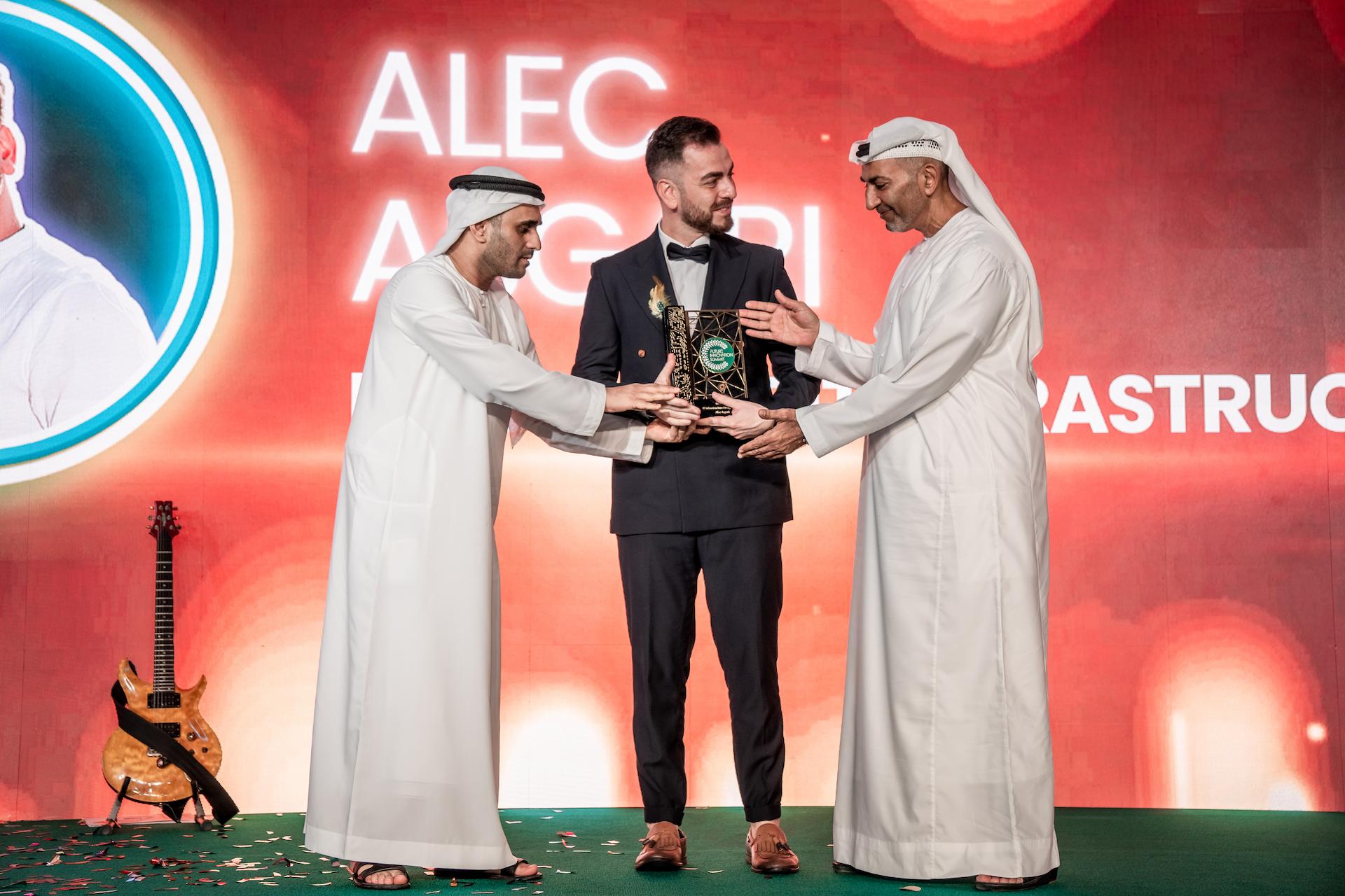Alec Asgari receiving the Best IT Company 2025 award at the Future Innovation Summit in Dubai
